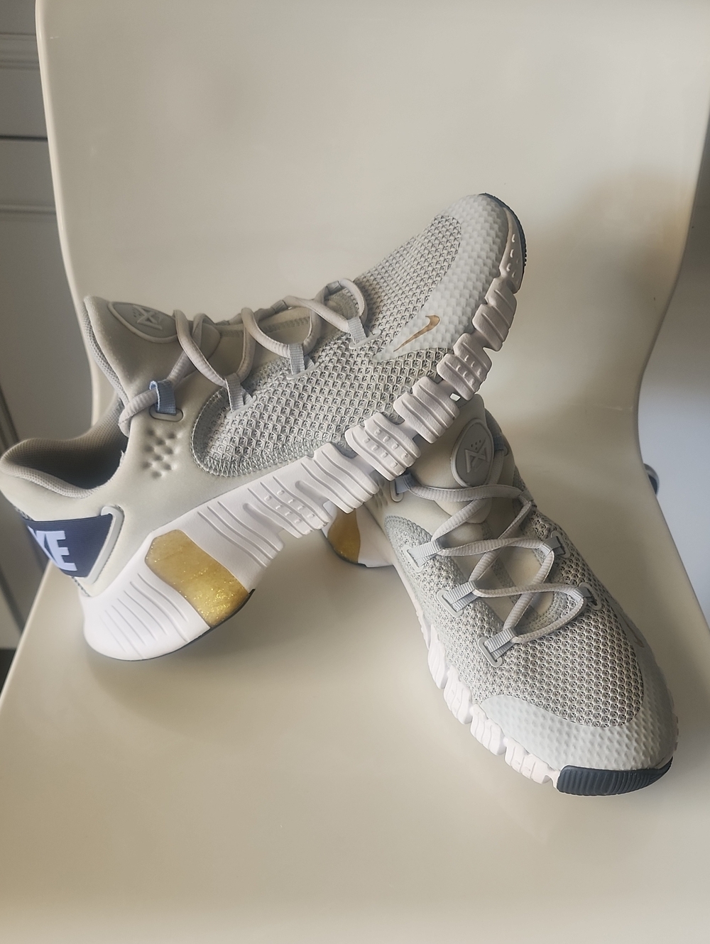 Women Nike Grey and Gold Athletic Sneakers